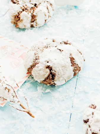 Chocolate brownie cookies on blue. Shallow dof.の写真素材
