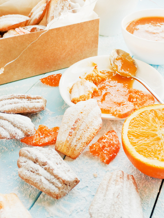 French cookies Madeleines with dried oranges. Shallow dof.の写真素材