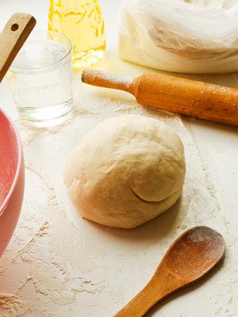 Dough kneading set of ingredients, preparation for baking. Shallow dof.の写真素材