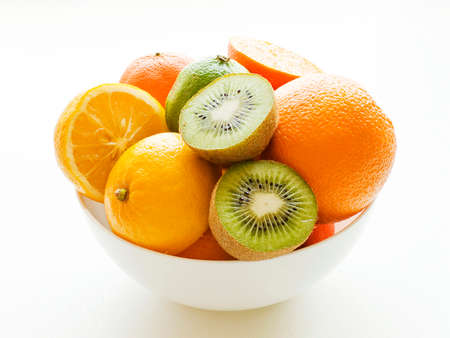 Fresh ripe citrus fruits on white background. Shallow dof.の写真素材
