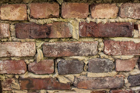 old rustic brick wall in natural colors