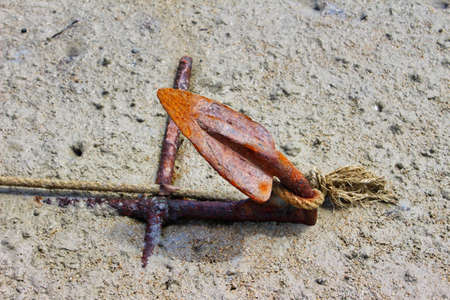 rusty anchor on beach thailand travel backgroundの写真素材