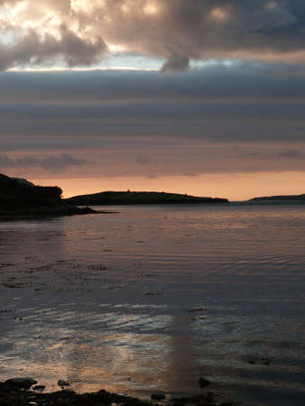 amazing sunset above the ocean in irelandの写真素材