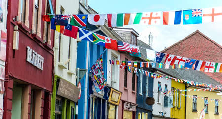 colorful house facades with flag garland in irelandのeditorial素材