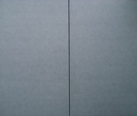 Close Up of a eternit wall (asbestos cement), with structure and detailsの写真素材