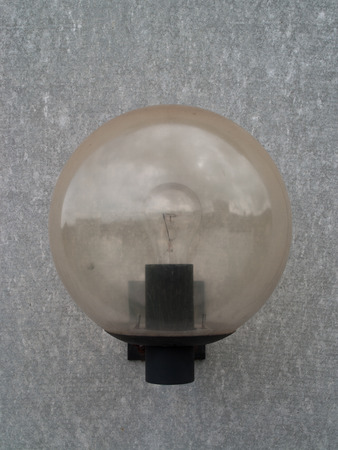Close Up of a eternit wall (asbestos cement), with a single lamp and structure and details
