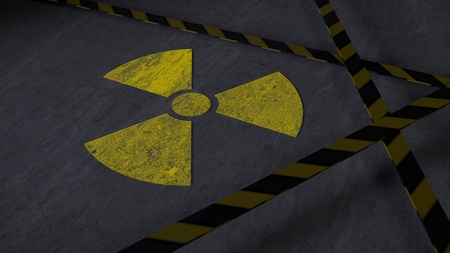 Dirty nuclear warning sign on concrete with warning planks (3d rendering)の写真素材
