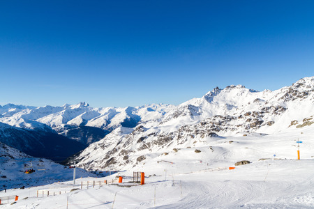view of the snow-capped mountains , ski slopes , ski lifts, Val Thorens,  Franceの写真素材