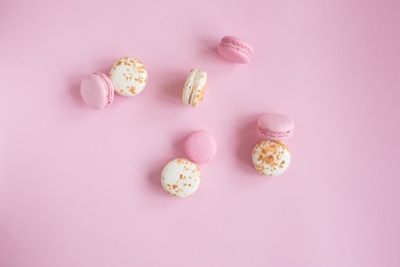 top view of tasty pink and whit? macaroons. raspberry and vanilla flavor