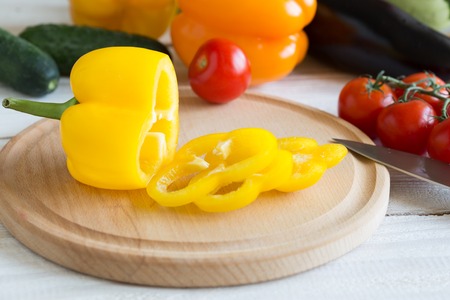 Fresh vegetables, ingredients for cooking a healthy lunch. Sweet peppers, tomatoes, cucumbers,...