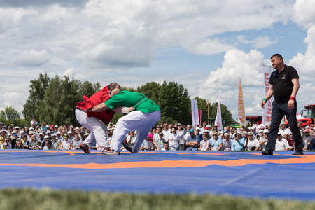 Ulyanovsk, June 18, 2022:Wrestlers competition.National struggle "kuresh". Men's wrestling. Sabantuy (Sabantui) is a traditional celebration of the end of spring field work.Wrestleのeditorial素材