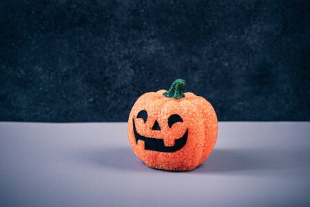 Happy Halloween Day, Spooky day. Pumpkin trick or treat basket, orange pumpkins, scary metal house
