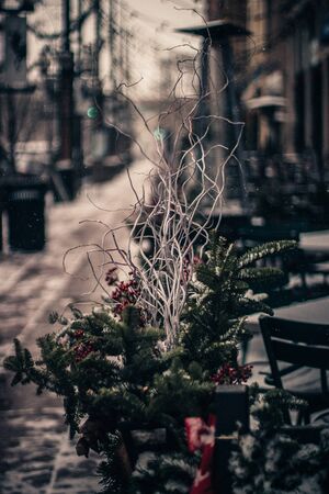 New Year's Eve snowing day in the city. Showing in the streets of Downtown. Snowy city streetsの写真素材