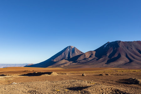 Licancabur and Juriques volcanoes located between the borders of Chile and Bolivia.の写真素材