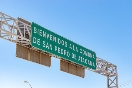 Welcome sign at the entrance of San Pedro de Atacama saying Bienvenidos a la comuna de San Pedro de...
