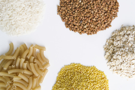 oatmeal, buckwheat, pasta, Millet Grits and rice on a white background
