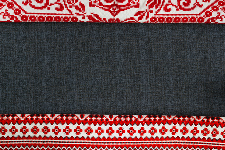 authentic embroidered towel on a black background, handmadeの写真素材