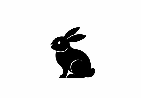 Rabbit Silhouette Clipart. Vector illustration design of a rabbit silhouette in solid black.の写真素材