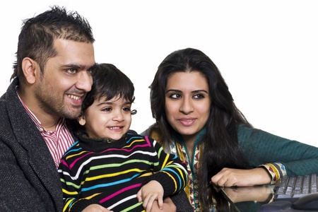 happy multi ethnic family of three enjoying togetherの写真素材