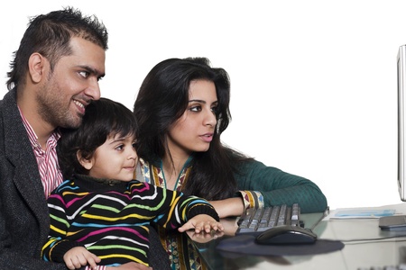 happy multi ethnic family of three enjoying togetherの写真素材