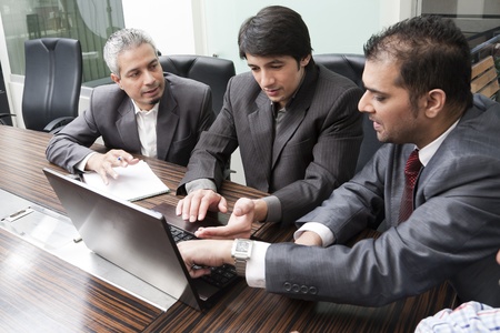 group of young multiracial businessmen in a meetingの写真素材
