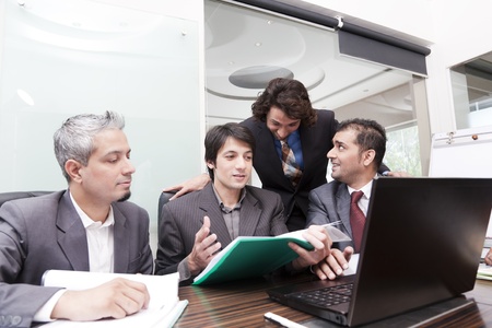 group of young multiracial businessmen in a meetingの写真素材