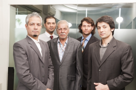 Group of businessmen in office, senior businessman with his colleaguesの写真素材