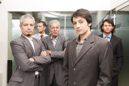 Group of businessmen in office, senior businessman with his colleaguesの写真素材