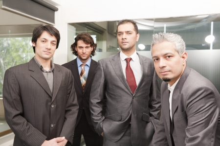 Group of businessmen in office, group of young executivesの写真素材