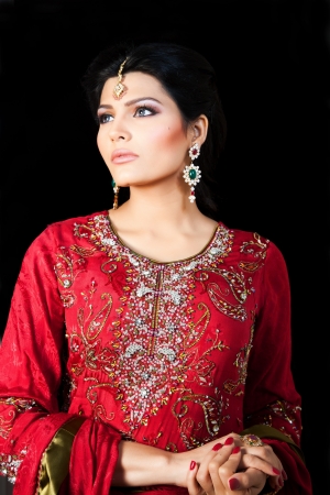 Muslim Indian bride wearing a red bridal dress, portrait of a beautiful Indian brideの写真素材