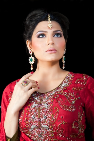 Muslim Indian bride wearing a red bridal dress, portrait of a beautiful Indian brideの写真素材
