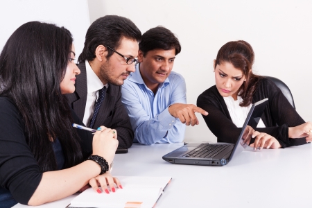 group of multi racial business people in meeting, Inidan business woman in meeting with young businessmen の写真素材