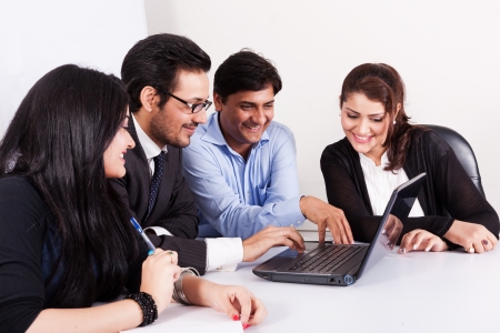 group of multi racial business people in meeting, Inidan business woman in meeting with young businessmen の写真素材