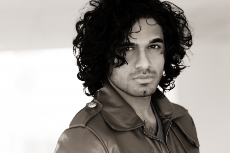 portrait of a confident man with afro hair style,の写真素材