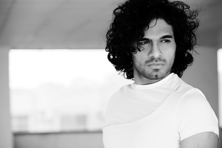 portrait of a confident man with afro hair style,の写真素材