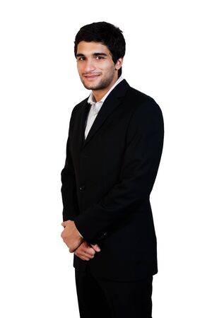 young happy business man standing with his arms crossed isolated on whiteの写真素材