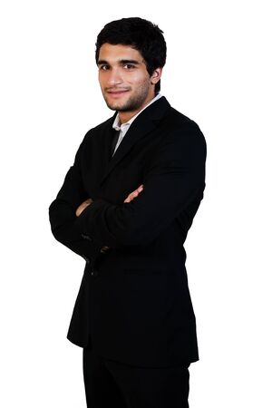 young happy business man standing with his arms crossed isolated on whiteの写真素材