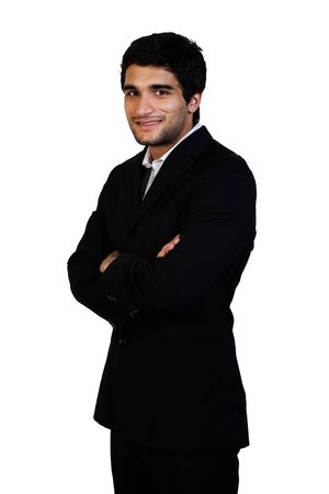 young happy business man standing with his arms crossed isolated on whiteの写真素材