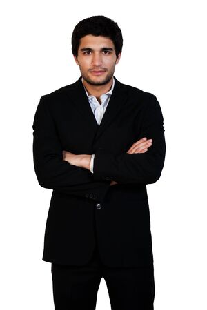 young happy business man standing with his arms crossed isolated on whiteの写真素材