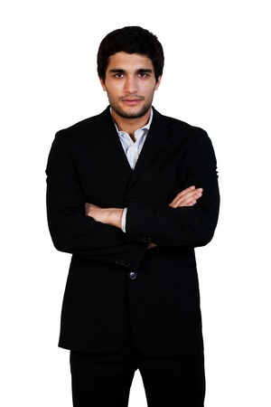 young happy business man standing with his arms crossed isolated on whiteの写真素材
