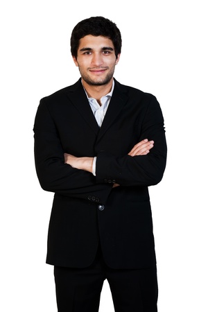 young happy business man standing with his arms crossed isolated on whiteの写真素材