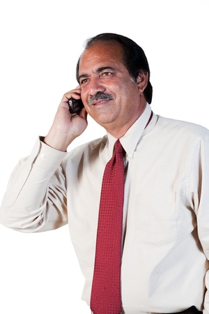 happy mature businessman talking on the mobilel phoneの写真素材