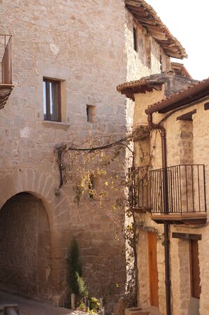 Stone street in a village, a traditional landscape in spanish villagesの写真素材