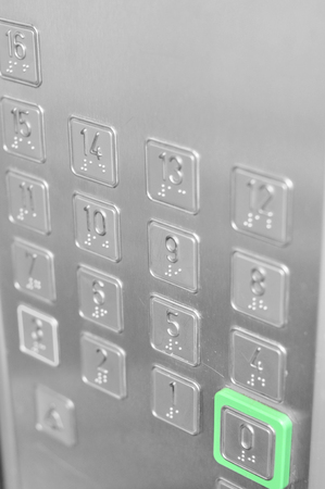 Elevator buttons in a little skyscraper