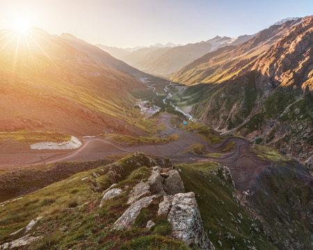 Russia, Kabardino-Balkaria, Elbrus region, mount Elbrus. View from the station horizon (3000m) to the clearing Azau and Baksanskoe gorge.の写真素材