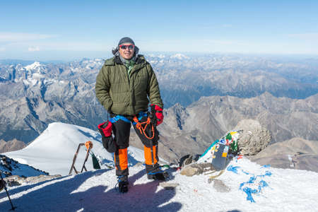 Caucasus / Russia - 09/09/2018 Group of climbers climbing mountain peaksのeditorial素材