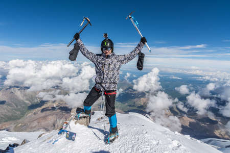Caucasus / Russia - 07.23.2018 Group of climbers climbing mountain peaks.のeditorial素材