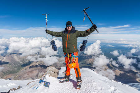 Caucasus / Russia - 07.23.2018 Group of climbers climbing mountain peaks.のeditorial素材