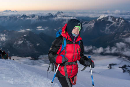 Caucasus / Russia - 06/08/2018 Group of climbers climbing mountain peak Elbrusのeditorial素材