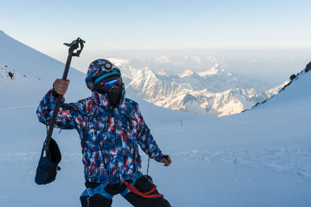 Caucasus / Russia - 22/06/2008 Group of climbers, acclimatization program in the mountains before climbing Mount Elbrus. Tourists take pictures on the background of high snowy mountain peaks.のeditorial素材